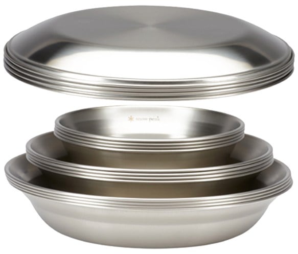 Snow Peak family camping tableware set displayed outdoors with food