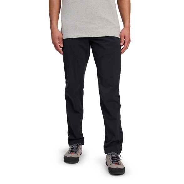 Front view of men's durable hiking pants with pockets in black, ideal for climbing and hiking