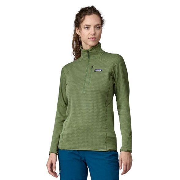 Patagonia Women's R1 Pullover side view, highlighting the deep zipper and off-shoulder seams.
