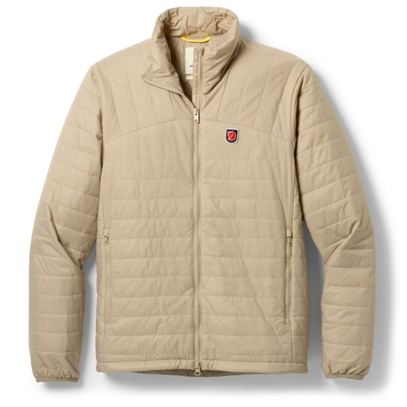 Fjallraven Expedition X-Latt men's insulated jacket in a snowy landscape, emphasizing warmth and packability.
