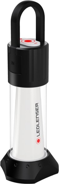 IllumaTrail LED lantern in use at a campsite, showcasing its warm glow.