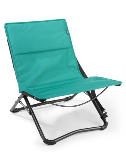 TrailEase FoldAway Chair on a sandy beach with carry strap visible – ideal outdoor seating setup