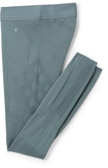 Side view of ThermaWool Intraknit merino base layer leggings showcasing 3D-knit articulation and rib-knit knees