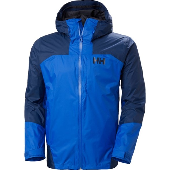 Front view of the Helly Hansen men's shell jacket on a hiking path.