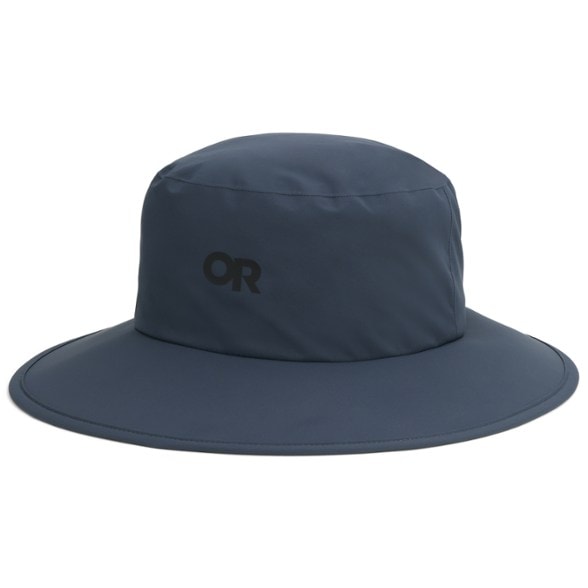Stratoburst rain hat shown in a forest setting, showcasing waterproof features.