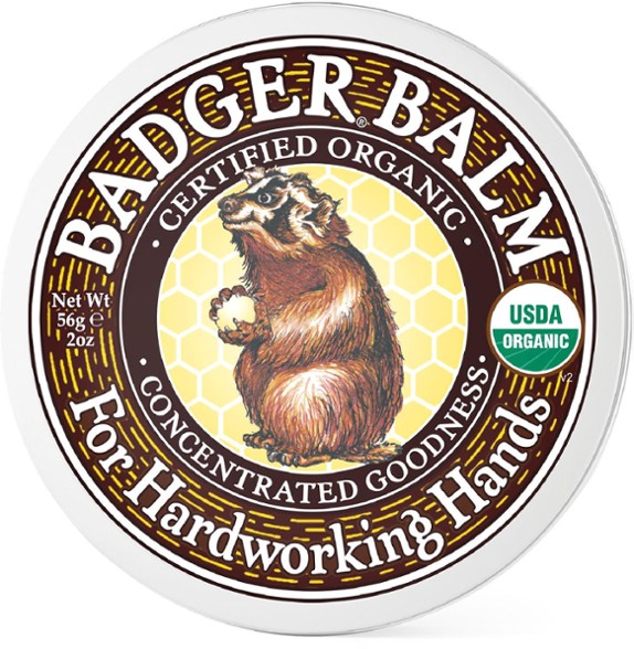 Close-up of Hardworking Hands Organic Balm tin showing rich texture and natural ingredients.