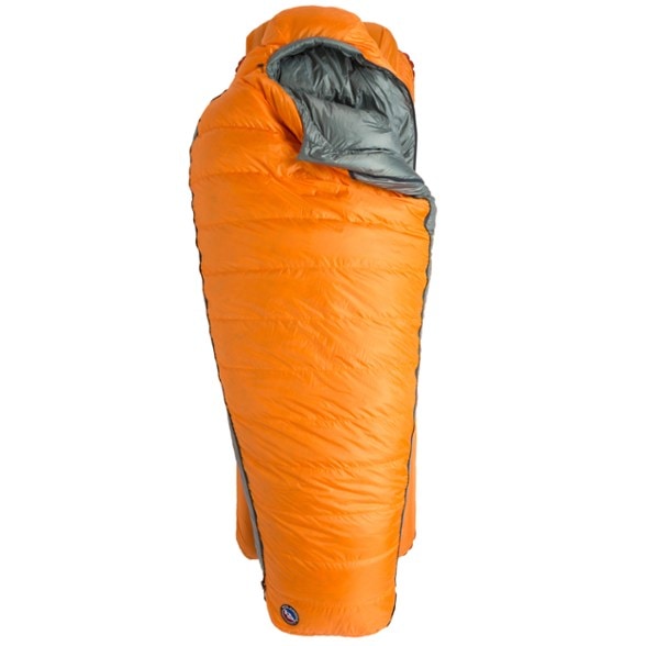 Big Agnes sleeping bag with expandable side panels displayed outdoors.