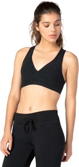 Lift Your Spirits Active Bra in action during a yoga session, showcasing its flexibility and support.