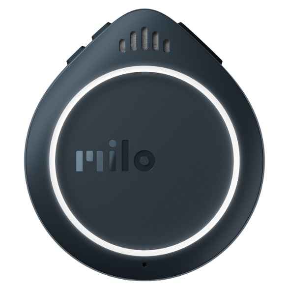 Milo communicator clipped to a hiker’s backpack during a snowy trail ascent