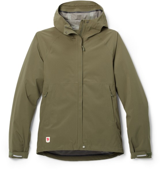 Hydratic women's waterproof trail jacket shown in a hiking setting, showcasing its breathable fabric.