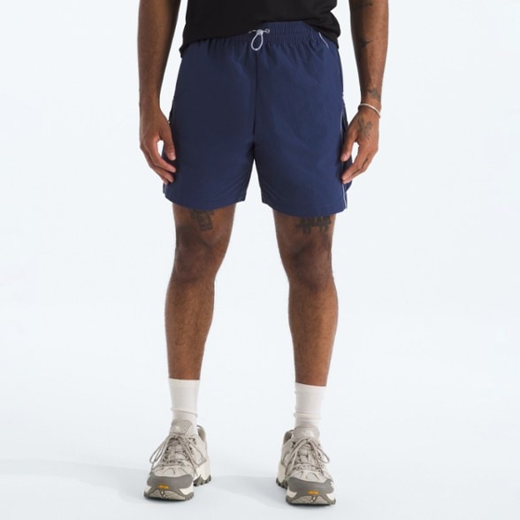 Men's adjustable hiking shorts in landscape view showcasing windproof fabric.
