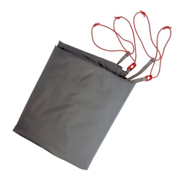 Top-down view of MSR Advance Pro 2 tent footprint laid out over rocky ground, showing full dimensions
