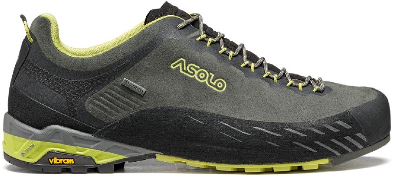 Side view of men's waterproof hiking shoes with Vibram outsole approach shoes for climbing on rocky terrain