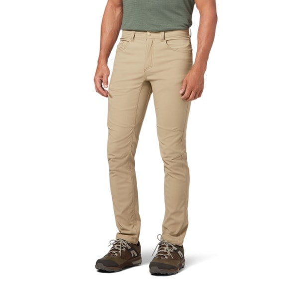 Front view of lightweight men's hiking pants with pockets, showcasing the slim fit and stretch fabric