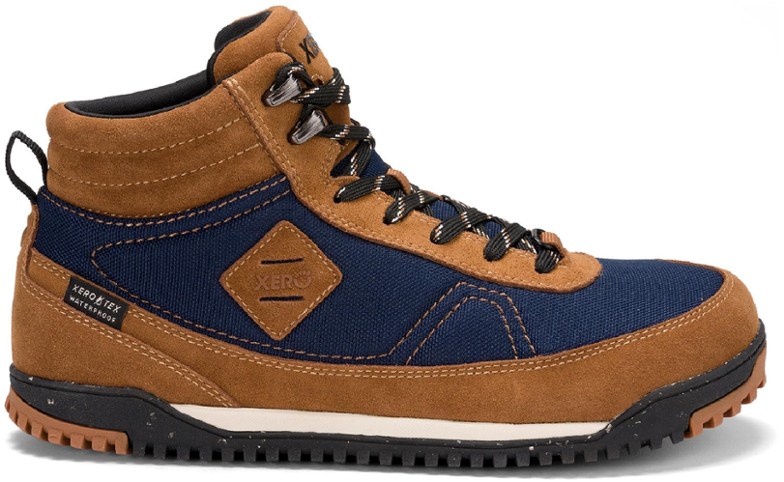 Side view of Ridgeway men's waterproof hiking boots on a rocky trail.