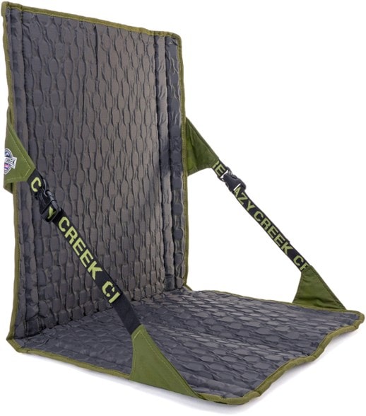 Hex 2.0 LongBack Camping Chair in use on a hiking trail, highlighting its lightweight design.