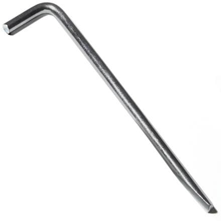 Close-up of heavy-duty steel tent stakes in use at a family campsite.