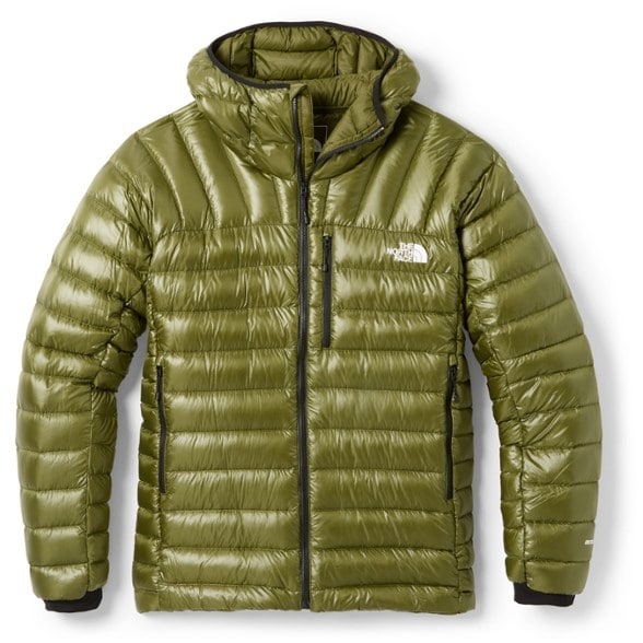 Summit Series 800 Fill Down Hoodie in action on a mountain trail, highlighting its water-resistant features.