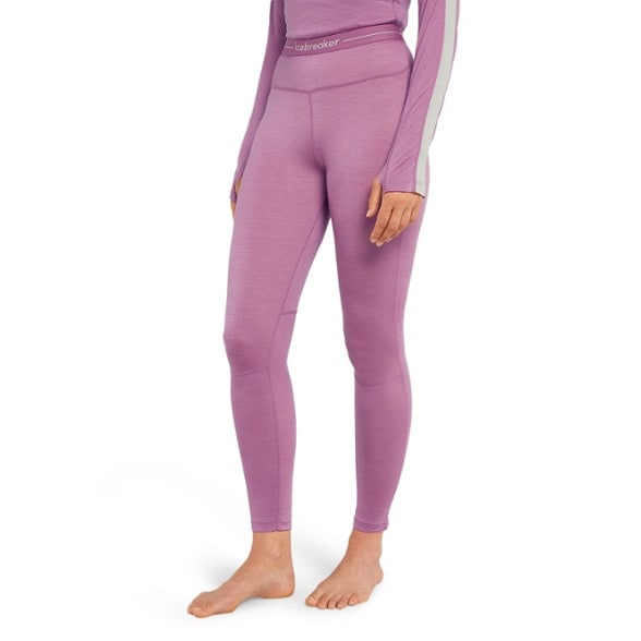 Front view of women's merino wool leggings showcasing breathable ZoneKnit mesh panels for temperature control
