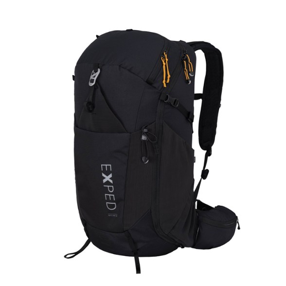 Front view of the lightweight backpack showing trekking pole loops and ergonomic shape