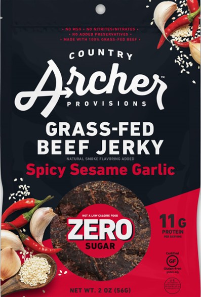 Zero sugar grass-fed beef jerky in a natural setting, ideal for outdoor adventures.