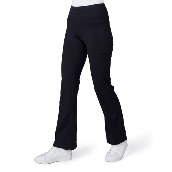 Side view of women's flare pants for hiking, showcasing the bootcut style.