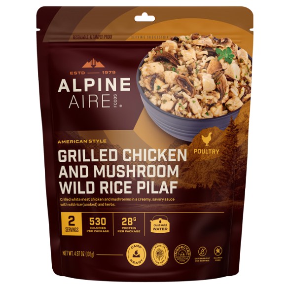 AlpineAire Grilled Chicken & Mushroom Wild Rice Pilaf in a camping setting.
