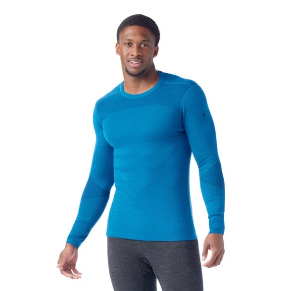 Front angle view of SmartKnit™ men's thermal top showing athletic slim fit and seamless merino blend