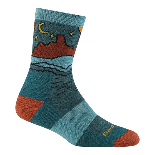 Celeste Merino Wool Cushion Crew Socks displayed on a wooden surface