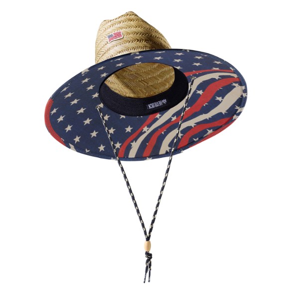 Side view of Nomad Voyager straw sun hat showing wide brim and handwoven texture for sun protection