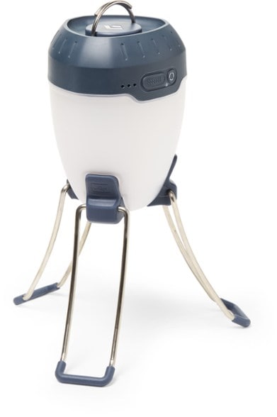 Top view of the LED lantern showing dual USB ports and folded legs for tabletop setup