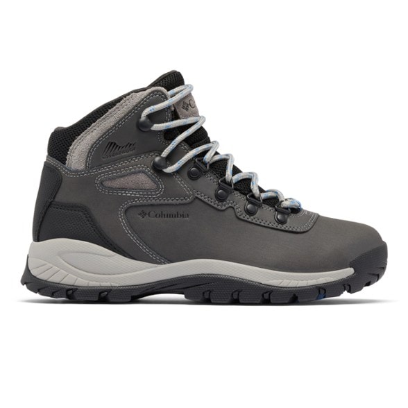Columbia women's hiking boots showing side view on rocky terrain