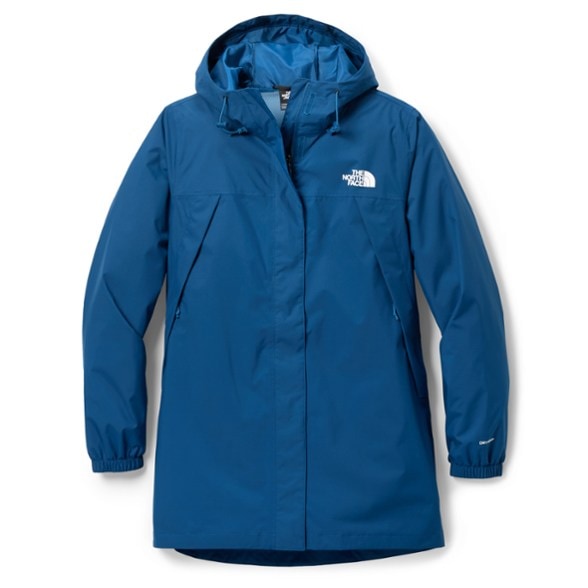 Front view of the eco-friendly women's waterproof parka in use during a hike.