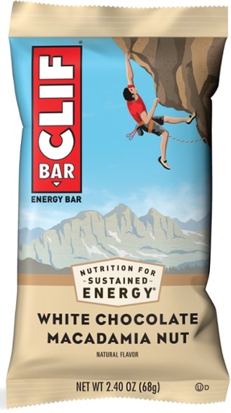 Clif FuelMax bar on granite rock beside hiking boots—best organic energy bars for hiking