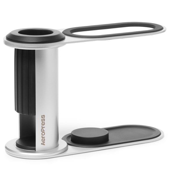 AeroPress coffee organizer stand showcasing its sleek stainless steel design from the side.