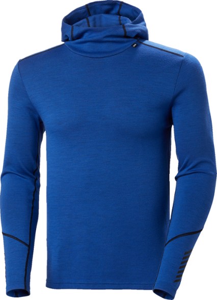 Men wearing LIFA Merino wool hoodie while skiing in snowy terrain.