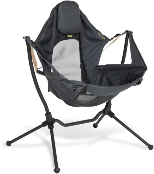 Luna Lounge Reclining Camp Chair in a natural setting, ideal for stargazing.
