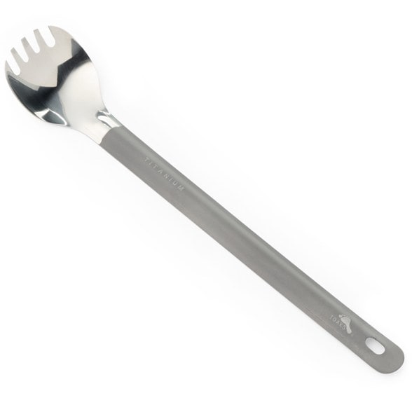 Close-up of titanium spork with polished bowl and long handle, ideal backpacking utensils