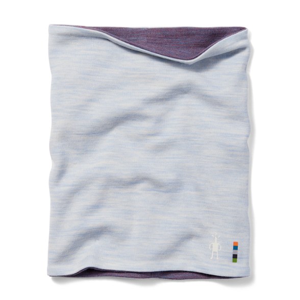 Close-up of the reversible merino wool neck gaiter showcasing its texture and double-layered design.