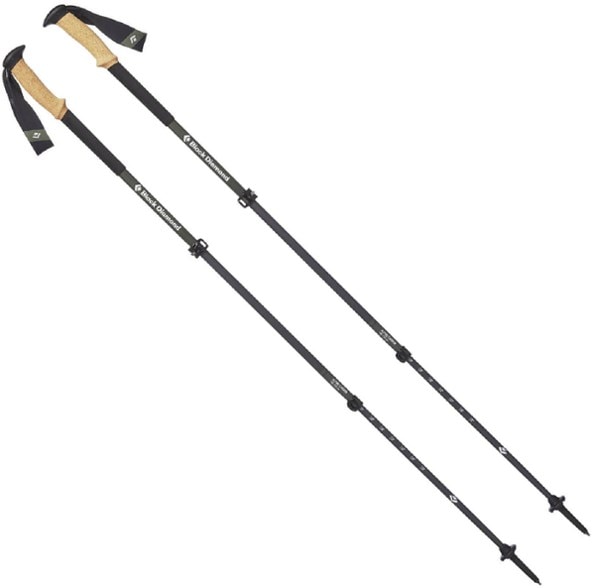 Close-up of SummitStride carbon fiber poles with ergonomic cork handles and FlickLock adjusters