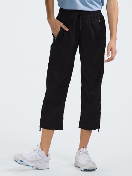 Front view of women's hiking pants showing quick dry water repellent fabric and adjustable waistband