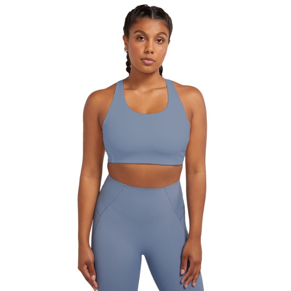 EcoActive Crop Compression Bra in action, showcasing its support during a run.