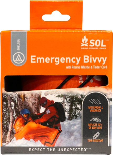 Emergency bivvy showing compact size next to a soda can.