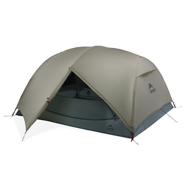 MSR Hubba Hubba LT 3-Person Tent setup in the woods, perfect for backpacking adventures.
