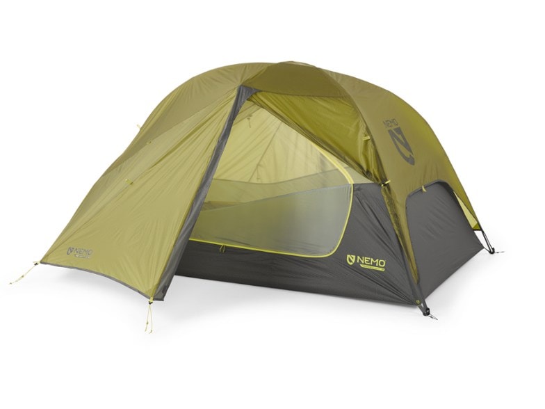 NEMO Dragonfly OSMO 2P tent setup in a scenic campsite, showcasing its spacious interior and dual doors.