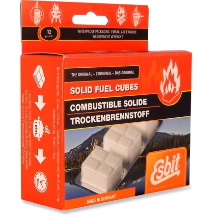 Close-up of solid fuel tablet burning cleanly inside an Esbit stove setup