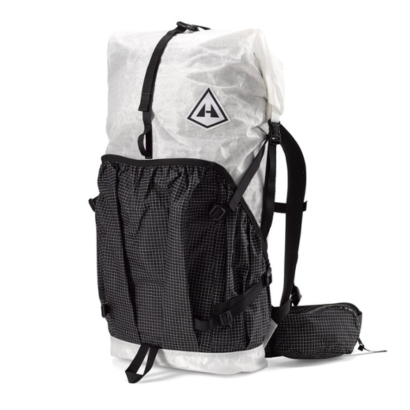 Hyperlite Southwest 55 ultralight backpack in action on a mountain trail, highlighting its tough Dyneema fabric.