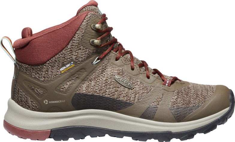 Side view of TrailPulse™ mid hiking boots showcasing waterproof grip on slick trails