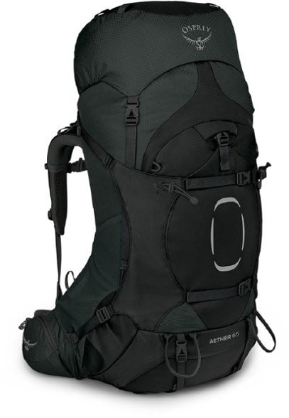 Osprey Aether 65 backpack in rugged terrain with adjustable straps.