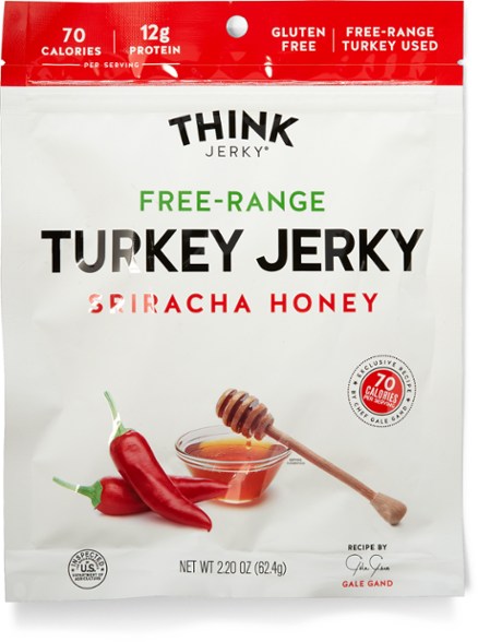 Gourmet Free-Range Turkey Jerky showcased in a rustic wooden bowl, perfect for healthy snacking.